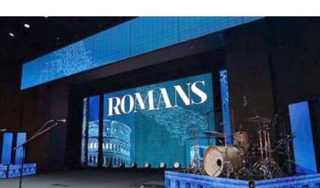 Stage LED wall in an auditorium, with instruments in the foreground