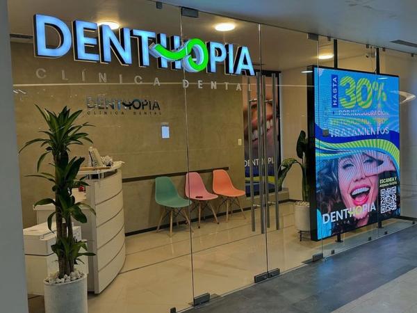 Vertical LED screen at the reception of a dental clinic